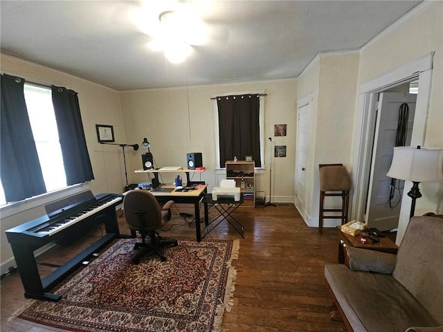 office space featuring ornamental molding, ceiling fan, and dark wood-type flooring