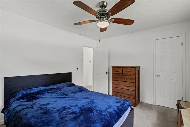 4051 Dixie Ln, Douglasville, GA 30135 - carpeted bedroom featuring baseboards and a ceiling fan