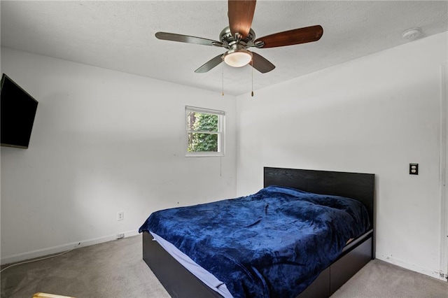 4051 Dixie Ln, Douglasville, GA 30135 - carpeted bedroom with baseboards and ceiling fan