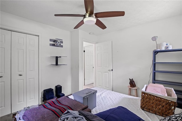 4051 Dixie Ln, Douglasville, GA 30135 - bedroom with a closet and a ceiling fan