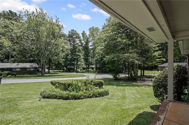 4051 Dixie Ln, Douglasville, GA 30135 - view of grassy yard featuring view of wooded area
