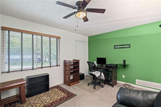 4051 Dixie Ln, Douglasville, GA 30135 - office with a textured ceiling, a ceiling fan, and carpet
