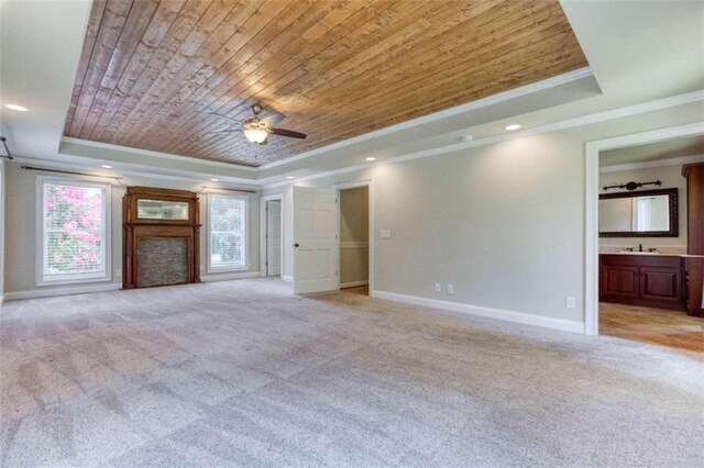 kitchen with white cabinetry, dishwasher, sink, ornamental molding, and light hardwood / wood-style floors