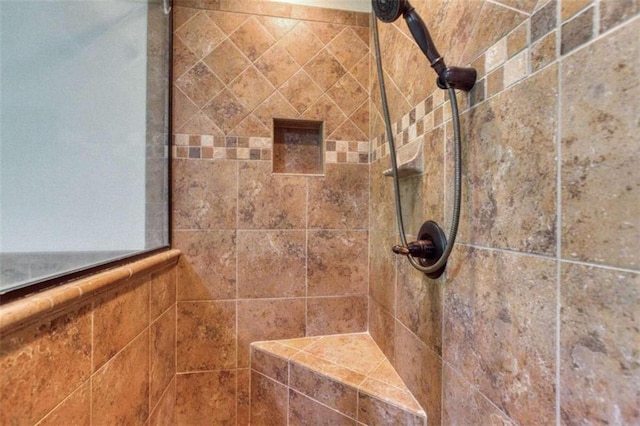 details with a tile shower