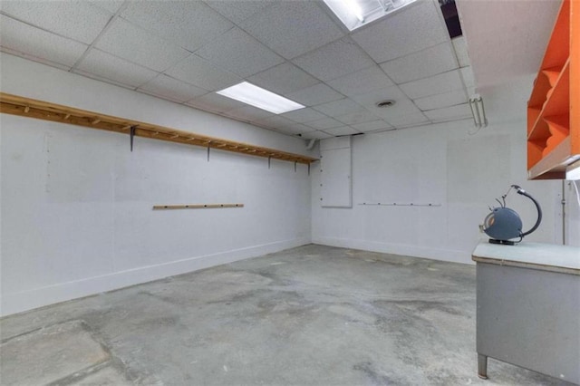 basement with a drop ceiling