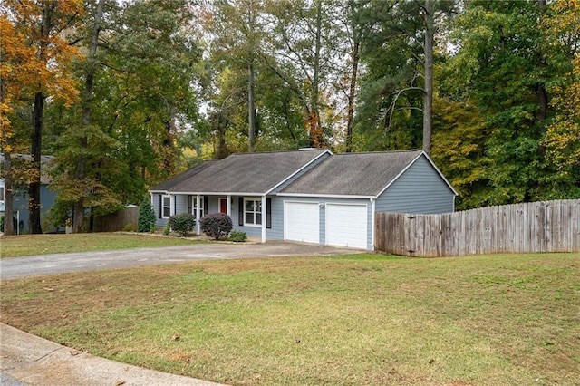 ranch-style home with aphalt driveway, a front lawn, and fence