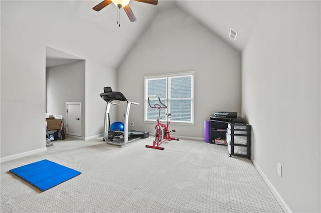 exercise area featuring visible vents, baseboards, high vaulted ceiling, and carpet flooring