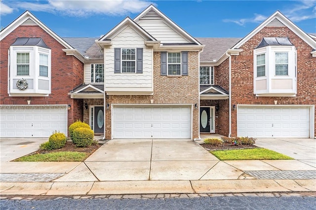 view of front of property with a garage