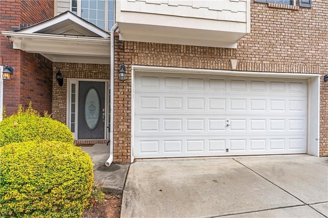 entrance to property featuring a garage