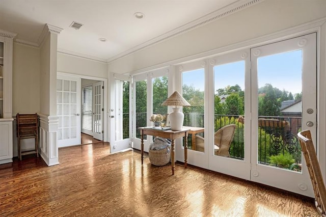 sunroom / solarium featuring french doors and a wealth of natural light