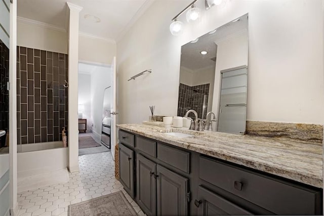 bathroom featuring tile patterned floors, vanity, and crown molding