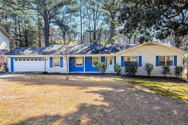 ranch-style house with brick siding, an attached garage, concrete driveway, and a front lawn