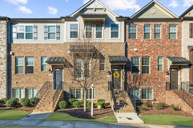 view of property with brick siding