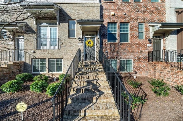 entrance to property with brick siding