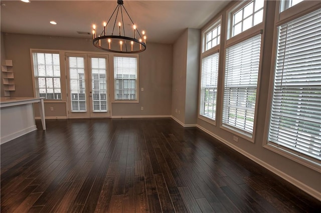 6603 Sterling Dr, Atlanta, GA 30328 - unfurnished dining area featuring a chandelier, baseboards, dark wood-style floors, and recessed lighting