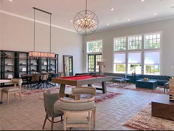 6603 Sterling Dr, Atlanta, GA 30328 - playroom with ornamental molding, a chandelier, billiards table, recessed lighting, and a towering ceiling