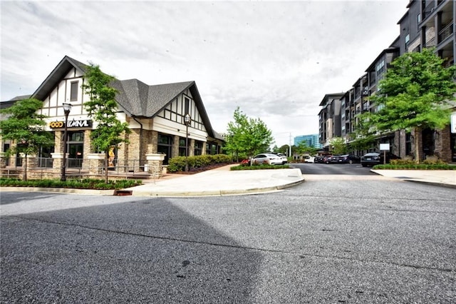 6603 Sterling Dr, Atlanta, GA 30328 - view of asphalt road featuring curbs