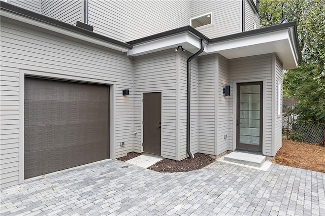 entrance to property with a garage