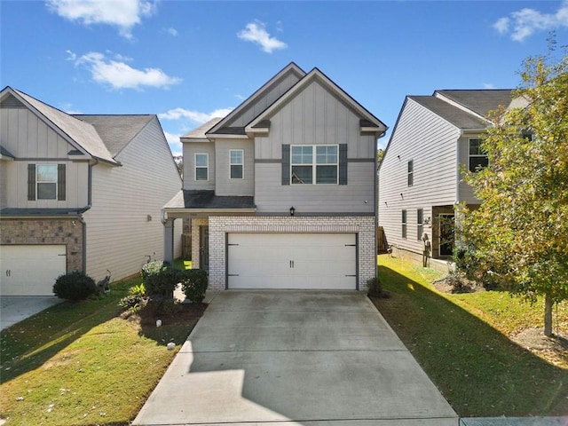 view of front of house with a garage and a front lawn