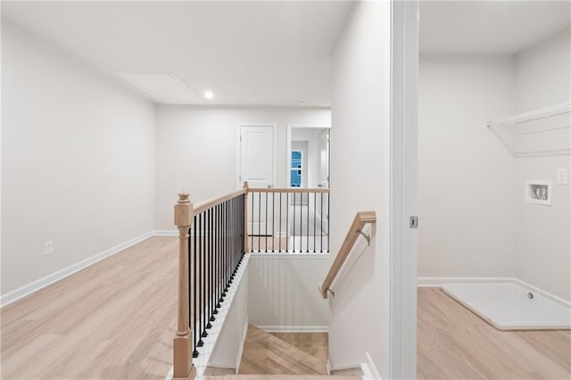 stairway with wood-type flooring