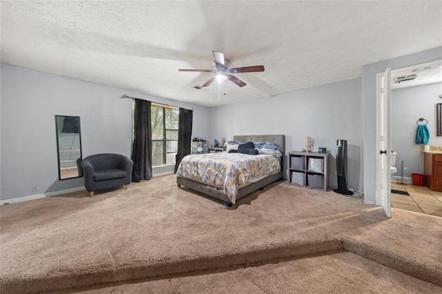 5016 Comanche Ct NW, Lilburn, GA 30047 - bedroom featuring carpet, a textured ceiling, ensuite bath, and a ceiling fan