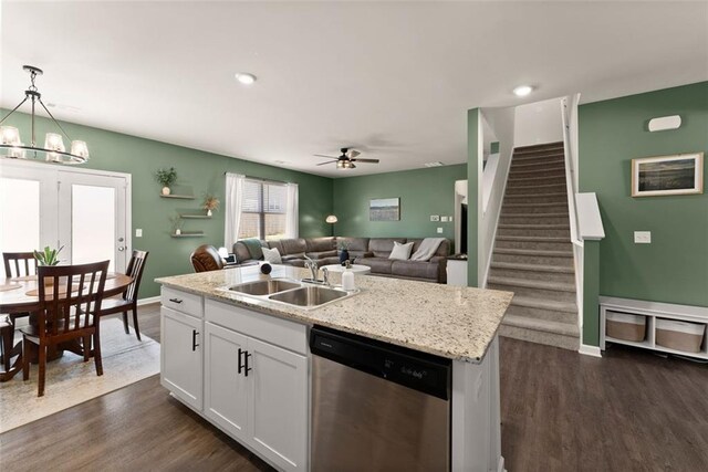 867 Starbuck Pkwy, Pendergrass, GA 30567 - kitchen featuring open floor plan, an island with sink, white cabinetry, a sink, and black appliances