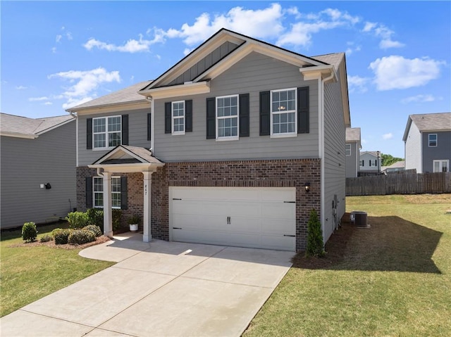 867 Starbuck Pkwy, Pendergrass, GA 30567 - view of front of home featuring brick siding, an attached garage, driveway, and a front lawn