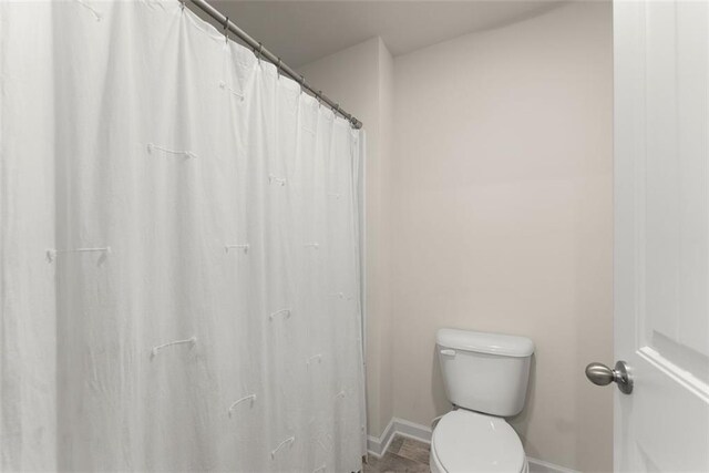 867 Starbuck Pkwy, Pendergrass, GA 30567 - bathroom featuring double vanity, a sink, and baseboards