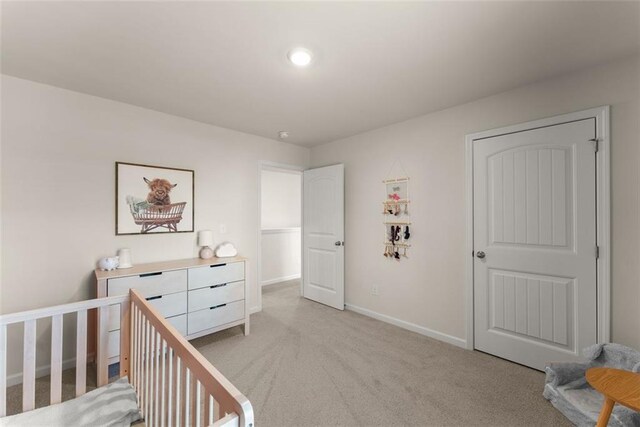867 Starbuck Pkwy, Pendergrass, GA 30567 - carpeted bedroom featuring a nursery area, baseboards, and visible vents