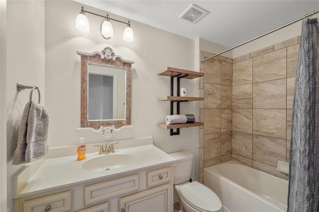 full bathroom with vanity, toilet, and shower / bath combo with shower curtain