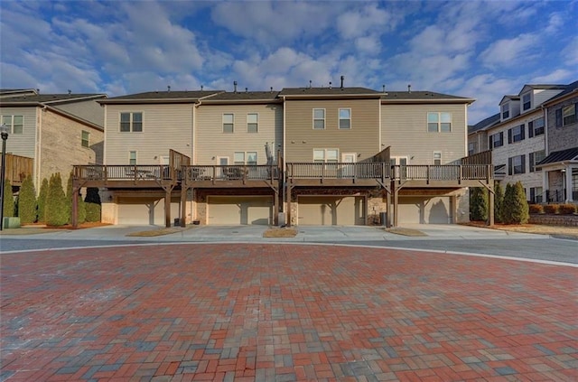 rear view of property with a deck