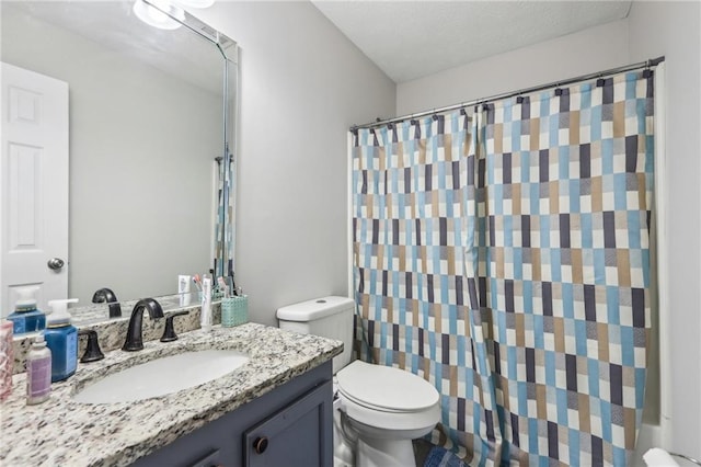 bathroom featuring a shower with curtain, toilet, and vanity