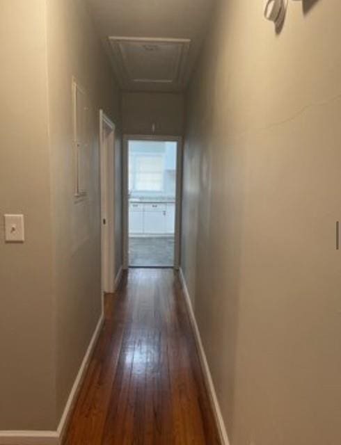 hall with dark wood-type flooring