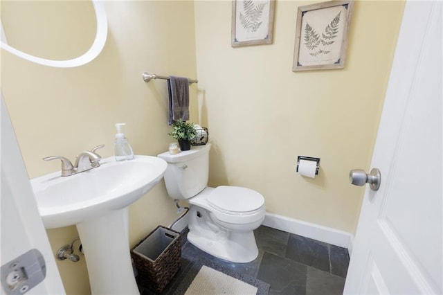 bathroom featuring toilet