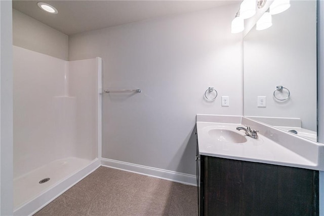 bathroom featuring vanity and walk in shower