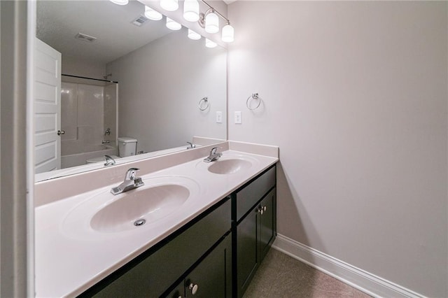 full bathroom featuring vanity, toilet, and shower / washtub combination