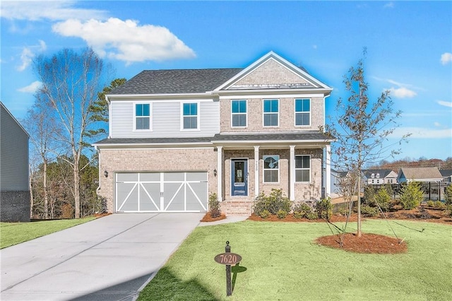 craftsman inspired home with covered porch, a garage, and a front lawn