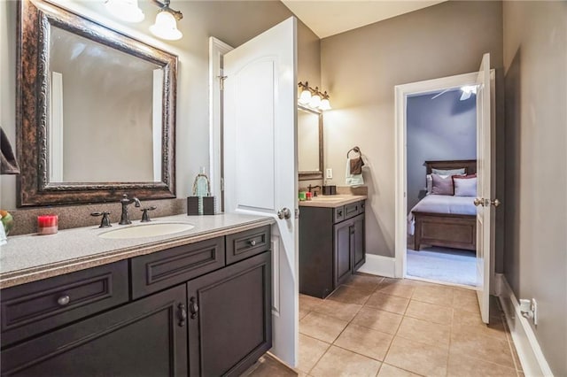 bathroom featuring tile patterned floors and vanity