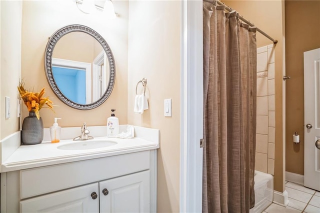 bathroom with vanity, tile patterned flooring, and shower / bath combo with shower curtain