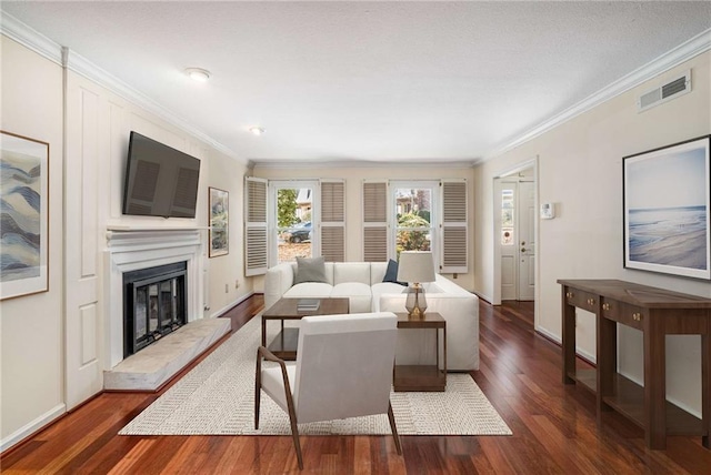 living room with crown molding and dark hardwood / wood-style flooring