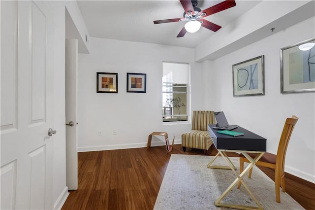 office featuring dark wood-type flooring and ceiling fan