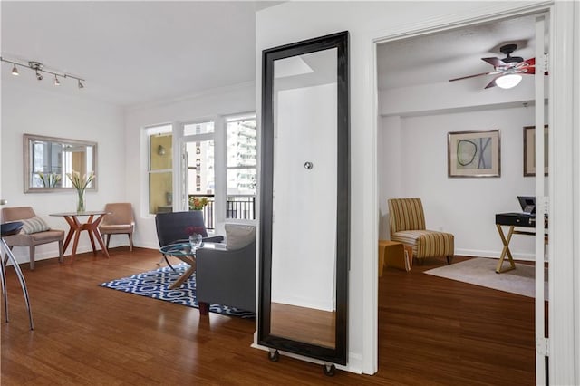 hall with hardwood / wood-style floors