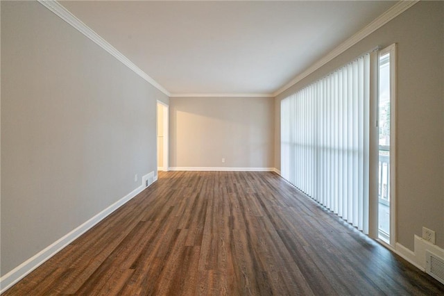 unfurnished room with ornamental molding and dark hardwood / wood-style floors