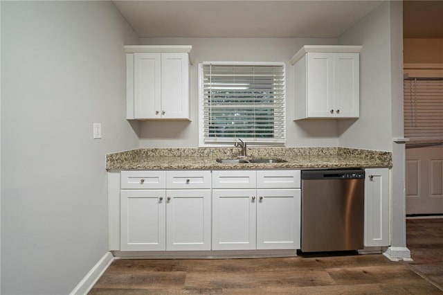 kitchen with sink, dishwasher, dark hardwood / wood-style floors, light stone countertops, and white cabinets