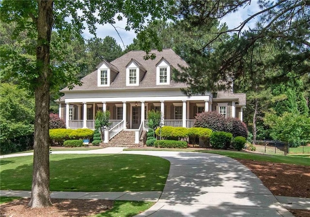 100 Trotters Rdg, Fayetteville, GA 30215 - cape cod home featuring a porch