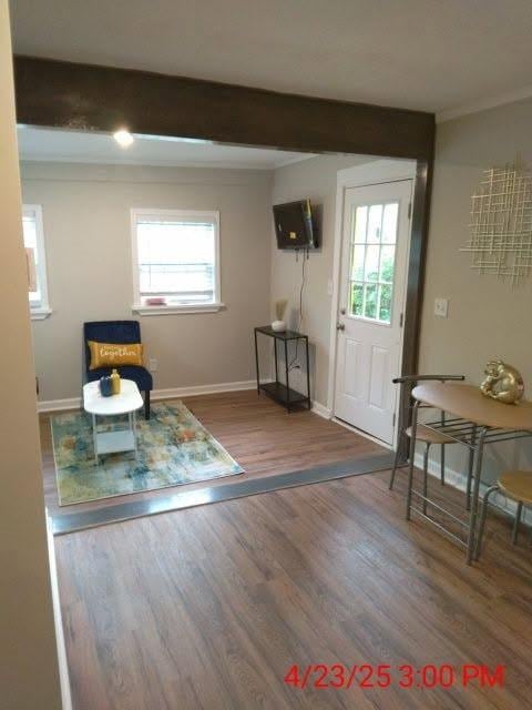 10 Rockmart Dr NW, Atlanta, GA 30314 - foyer with healthy amount of natural light, baseboards, wood finished floors, crown molding, and beamed ceiling