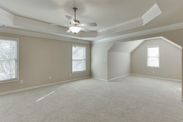 bonus room with light colored carpet and ceiling fan