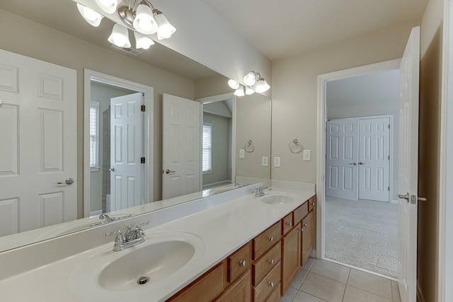 bathroom featuring tile patterned floors and vanity