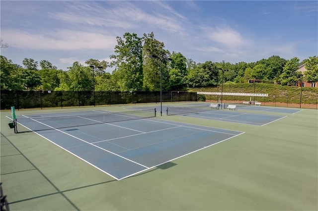 view of sport court featuring basketball hoop