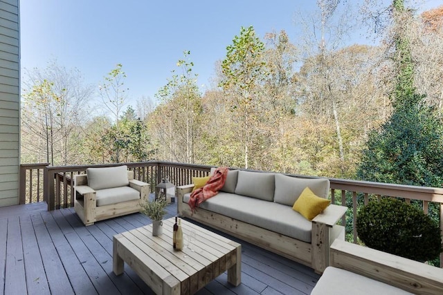 wooden deck with an outdoor hangout area